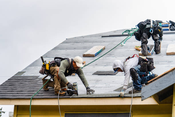 Professional Gutter Installation technician working in Smithtown, NY